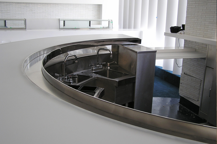 image of counter with single speed rail, custom one compartment sinks at Kumo Los Angeles