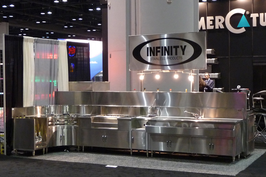image of NAFEM trade show booth showing various stainless steel backbar equipment
