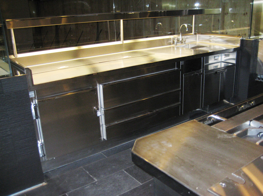image showing custom stainless steel backbar refrigerator with one compartment sink, dump station, three drawers and one door at Grand Hyatt Manhattan
