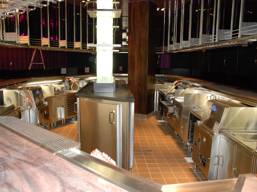 image showing custom refrigerator unit in center of room with custom stainless steel backbar equipment surrounding it at Johnny Smalls in Las Vegas