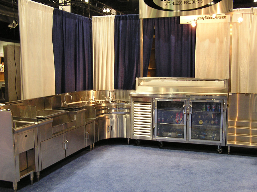 image of various infinity stainless backbar equipment at western food services trade show
