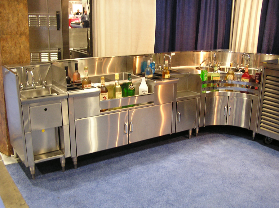 image of stainless steel bar configuration showing hand sink and various backbar equipment