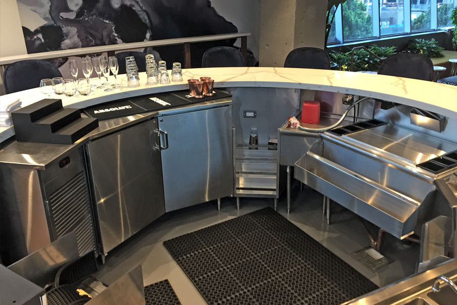 image of stainless steel back bar equipment in circular bar configuration